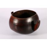 Carved wooden milk or food bowl with twin handles, possibly Kenya, Masai, 13cm x 20cm.