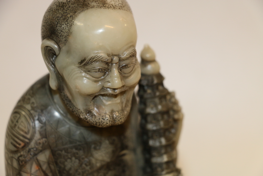 Large late 19th century Chinese soapstone carving of a bearded seated lohan holding a model of a - Image 13 of 18