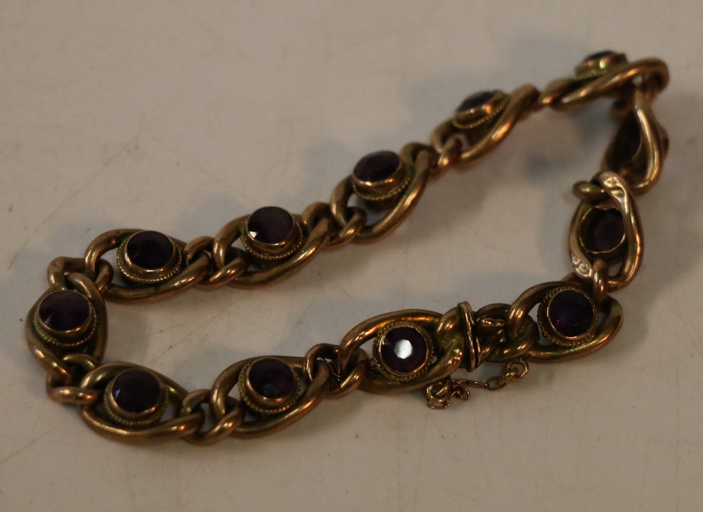 9ct gold bracelet set with twelve faceted amethysts, 12.8g gross