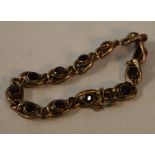 9ct gold bracelet set with twelve faceted amethysts, 12.8g gross