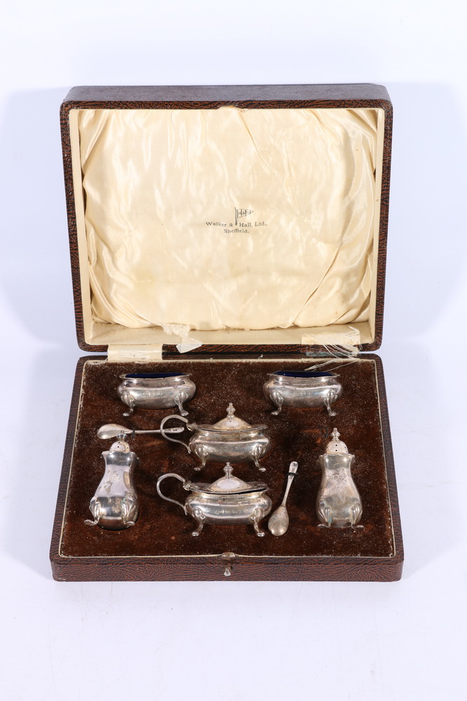 George V silver six-piece cruet set, most by Walker and Hall Birmingham 1930, 208g gross in fitted