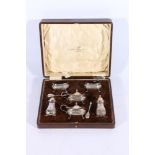 George V silver six-piece cruet set, most by Walker and Hall Birmingham 1930, 208g gross in fitted