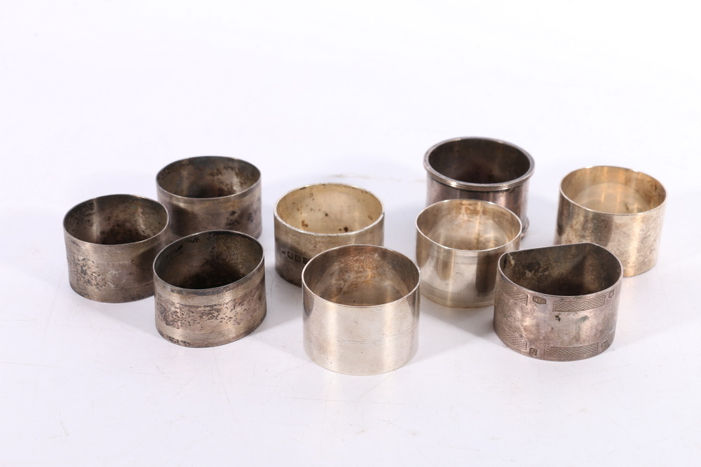 Nine silver napkin rings including one by Joseph Lenton Edinburgh 1946, 269g gross, (9)