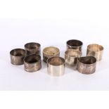 Nine silver napkin rings including one by Joseph Lenton Edinburgh 1946, 269g gross, (9)