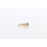 18ct gold sapphire and diamond ring, the two large diamonds approximately 0.45ct each and the two