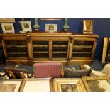 Victorian Walnut breakfast library bookcase, the marble top raised on moulded plinth, over four gla