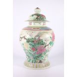Large 19th Century Chinese famille rose baluster vase and domed cover, the body decorated with a