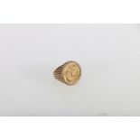 Edward VI sovereign 1909 in 9ct gold ring mount, 16.8g gross