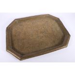 Indian brass tray of octagonal shape with incised decoration of delies and a lion on a ground of