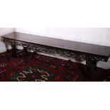 Late 19th or early 20th century Chinese hardwood low long table the pierced frieze carved with