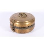 Indian brass chapatti box and hinged cover, with floral knop and ring handle, incised and punched