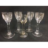 Set of four 19th century faceted stem drinking glasses with wheel etched floral bowls, 14cm tall and