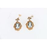 Pair of Victorian unhallmarked yellow metal faceted pale blue stone, possibly aquamarine, earrings