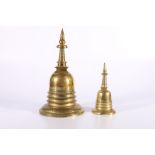19th Century Tibetan bronze box in the form of a Stupa, the domed lid revealing an internal box or