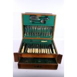 Mappin and Webb silver plated canteen of flatware for twelve places within oak case with base
