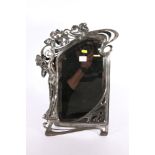 A German WMF style Art Nouveau silver plated dressing table mirror with classical maiden picking