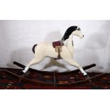 29th century painted wood rocking horse on bow rocker, 142cm long