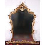 French Rococo style gilt overmantle wall mirror with C scroll and floral perimeter, 147cm x 120cm