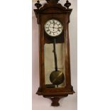 19th century walnut cased Vienna wall clock, the white enamel dial with Roman numeral chapter