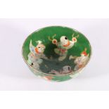 Chinese early 20th century small bowl, the dark green ground decorated with children, playing,