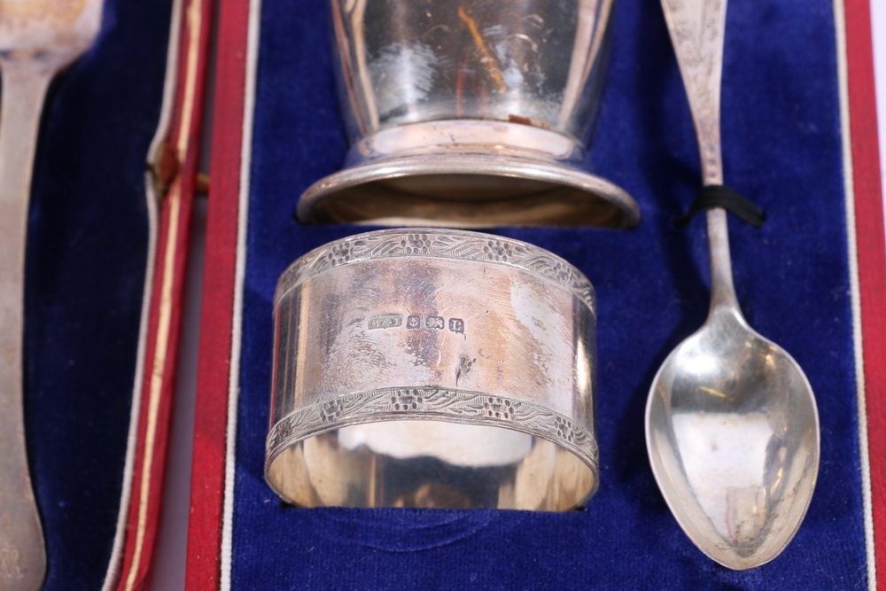 George V silver christening set with egg cup, spoon and napkin ring by Hamilton and Inches - Image 2 of 2