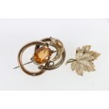 Unhallmarked yellow metal leaf brooch stamped "GP" 6.7g and a Victorian citrine set brooch 19.1g, (
