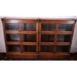Pair of oak Globe Wernicke style stacking bookcases, each of three sections raised on plinth