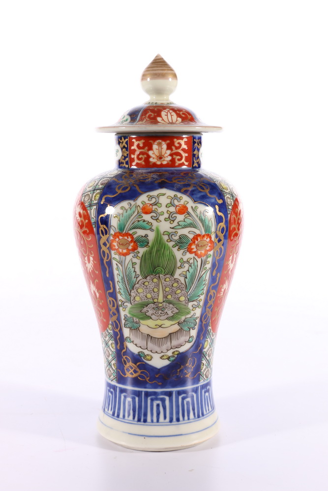 Japanese Imari vase and cover the high shouldered body decorated with Kylin and flower panels, 26 cm