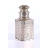 Persian silver tea caddy with domed top, the body of octagonal section decorated with animals, birds