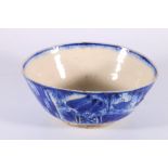 18th or 19th century Iranian blue and white deep bowl, central floral decorative roundel, the