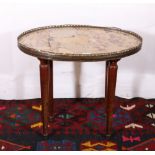 19th century French occasional table with oval marble top, pierced brass gallery raised on four