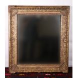 Gilt wood overmantle wall mirror or rectangular shape with floral pattern border, 112cm x 97cm
