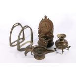 19th century Indian bronze oil lamp with peacock decoration to the handle, another Indian bronze