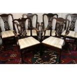 Set of six 19th century Hepplewhite style mahogany carver chairs, pierced spalts, outswept arms