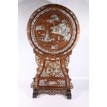 Chinese late 19th Century abalone inlaid screen and stand, the pierced and carved circular screen