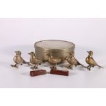 Set of five Iranian white coloured metal birds, decorated with punched decoration, each 7.5cm