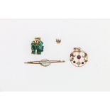 9ct gold ruby pendant 1.2g, a 15ct gold turquoise set bar brooch 1.67g and a gold mounted