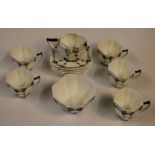 Shelley Art Deco thirteen piece porcelain sun set and trees tea set, registration number 723404