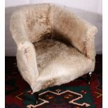 19th century tub chair upholstered with sheep skin, penned to underside "This Chair was Re-Covered