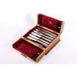 Cased set of six silver plated fish knives and forks in mahogany and inlaid case bearing the label R