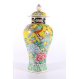 20th Century yellow ground vase, decorated with a bird amongst flowering branches, domed lid, 31cm.