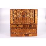 Japanese inlaid jewellery cabinet with tambour front enclosing three short drawers with two short