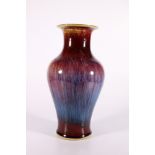 20th Century Chinese vase decorated with a glossy sang de boeuf glaze, the high shouldered vase with