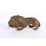 19th century cast bronze model of lion, 16cm long