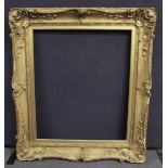 19th century gilt picture frame with foliate and shell moulding, to fit image 76.5cm x 64cm.