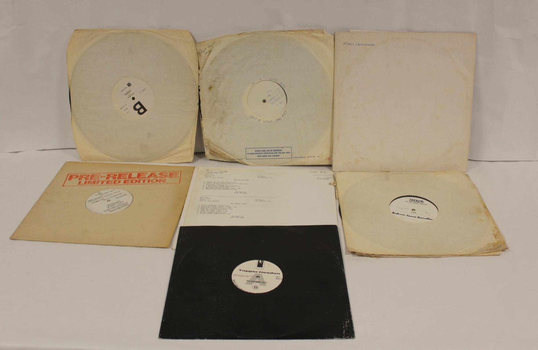 Collection of white label 12" singles to include 'In A Glass House' by Gentle Giant, 'Hello' by