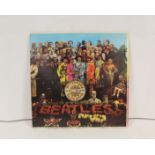 Beatles 'Sgt Pepper' LP, US pressing, with flame inner and insert and rainbow rim label. Without the