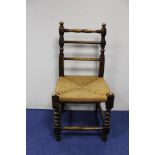 Antique elm bobbin turned child's chair, with rushwork seat