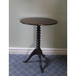 Victorian oval mahogany occasional table, bobbin turned column and tripod supports.