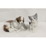 Lladro porcelain figure group of a puppy and kitten, 10cm high and another of a cat, 14cm  (2)